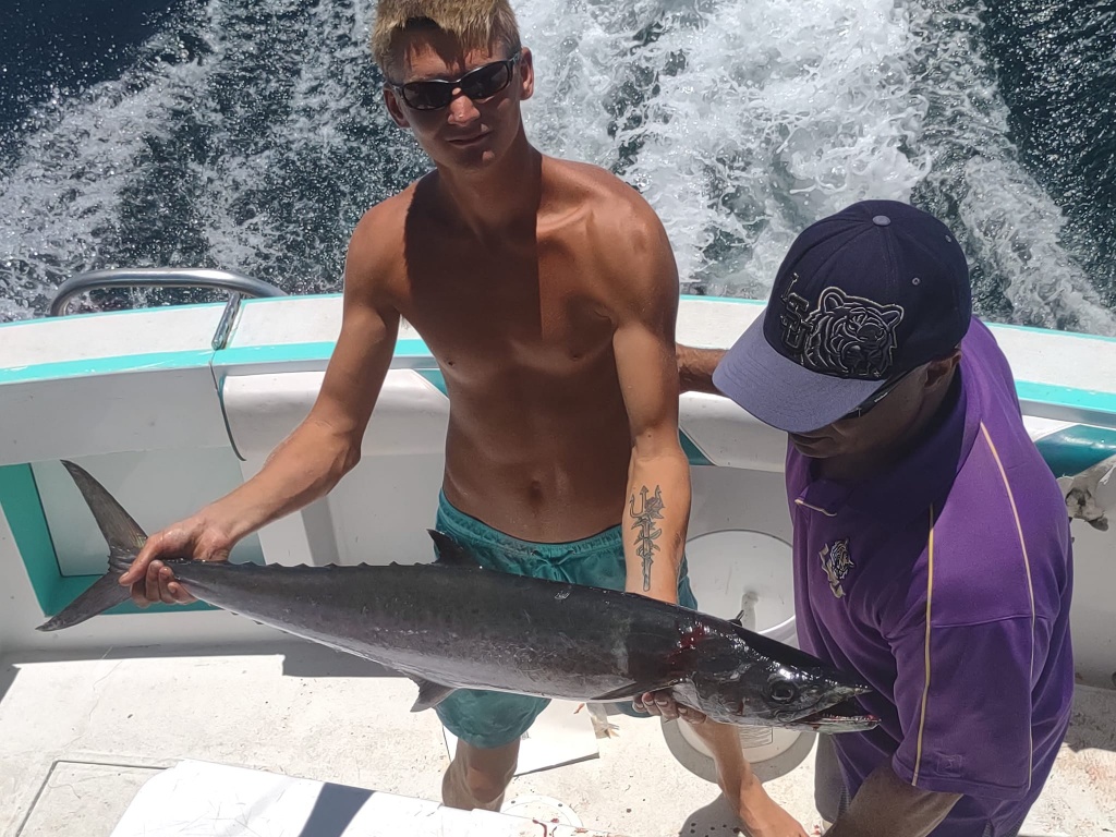 Angler with a large King Mackerel fish in Pensacola