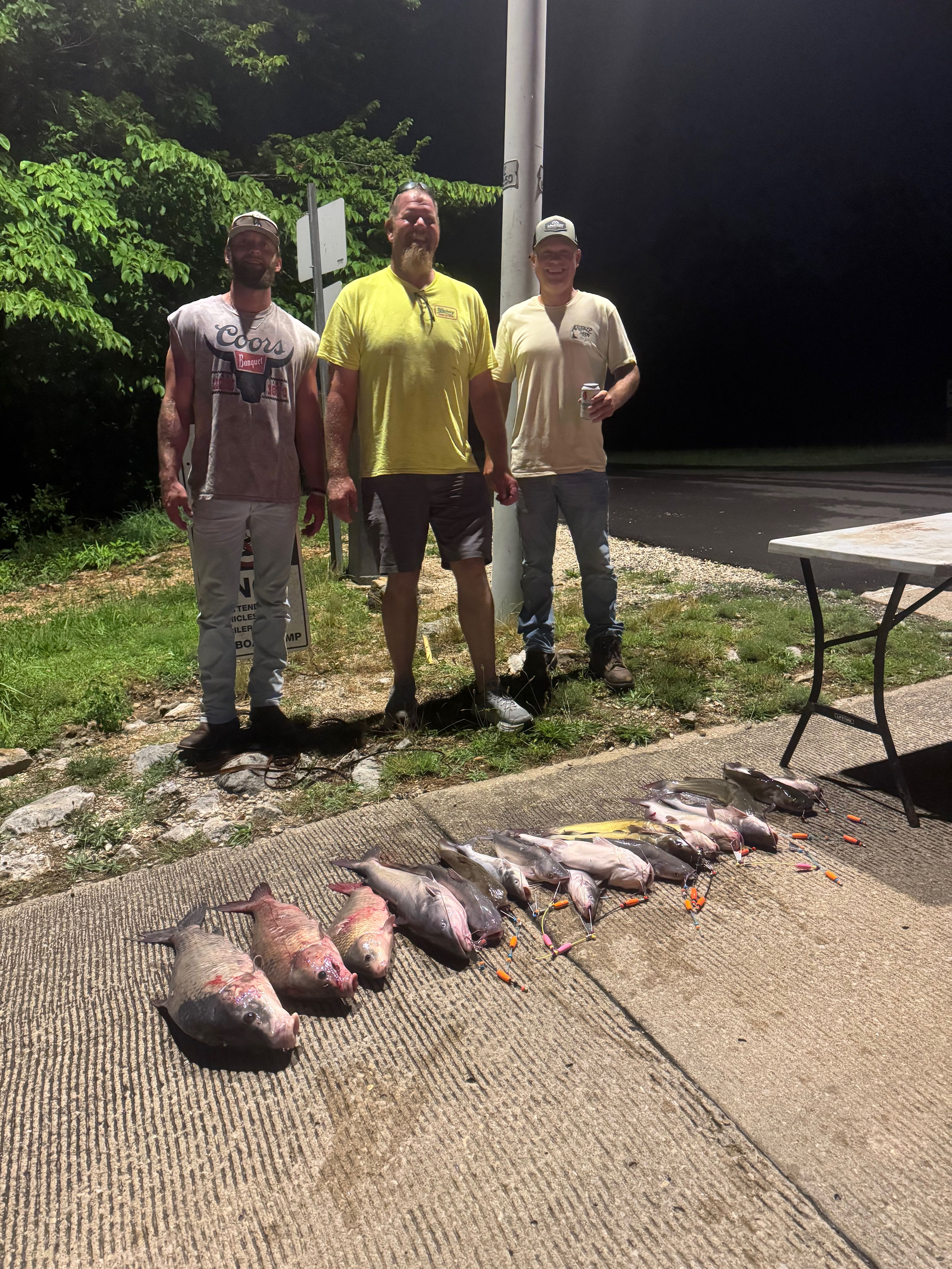 Fresh caught fish laid out on dock after successful fishing trip