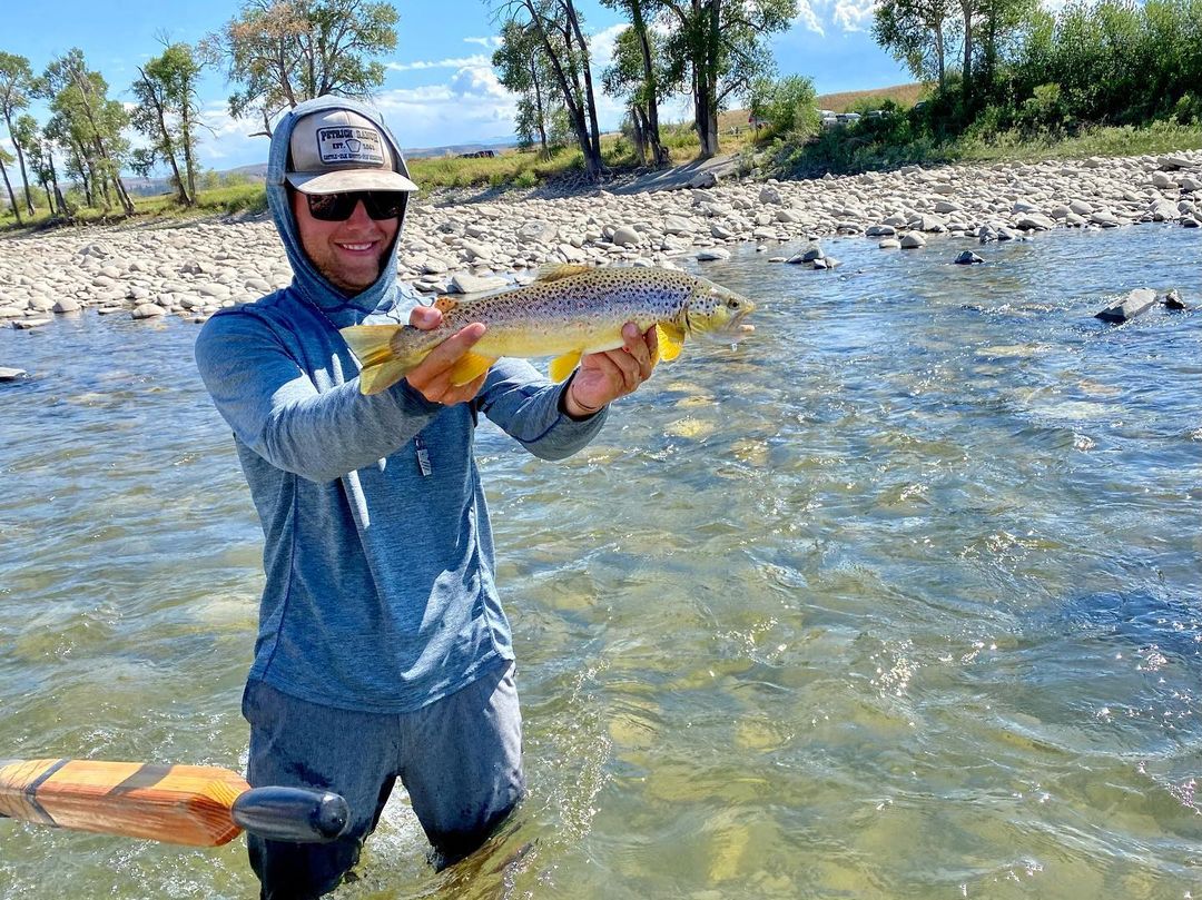 Photograph of a 15-inch sea trout caught while fishing in MT.