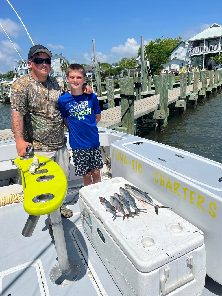 Two people fishing in Swansboro