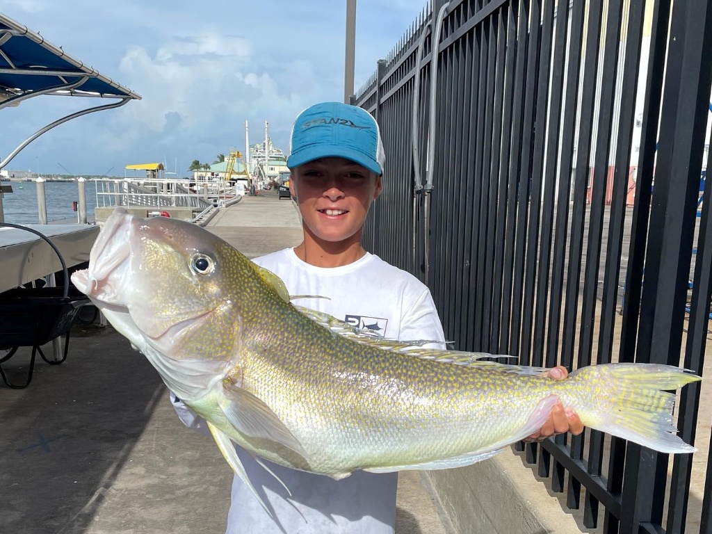 Angler holding a 35-inch fish in FL