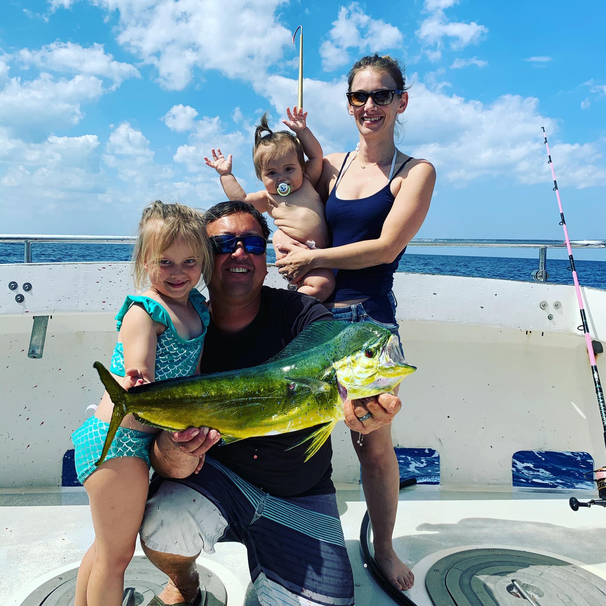 A group of 5 people fishing in FL