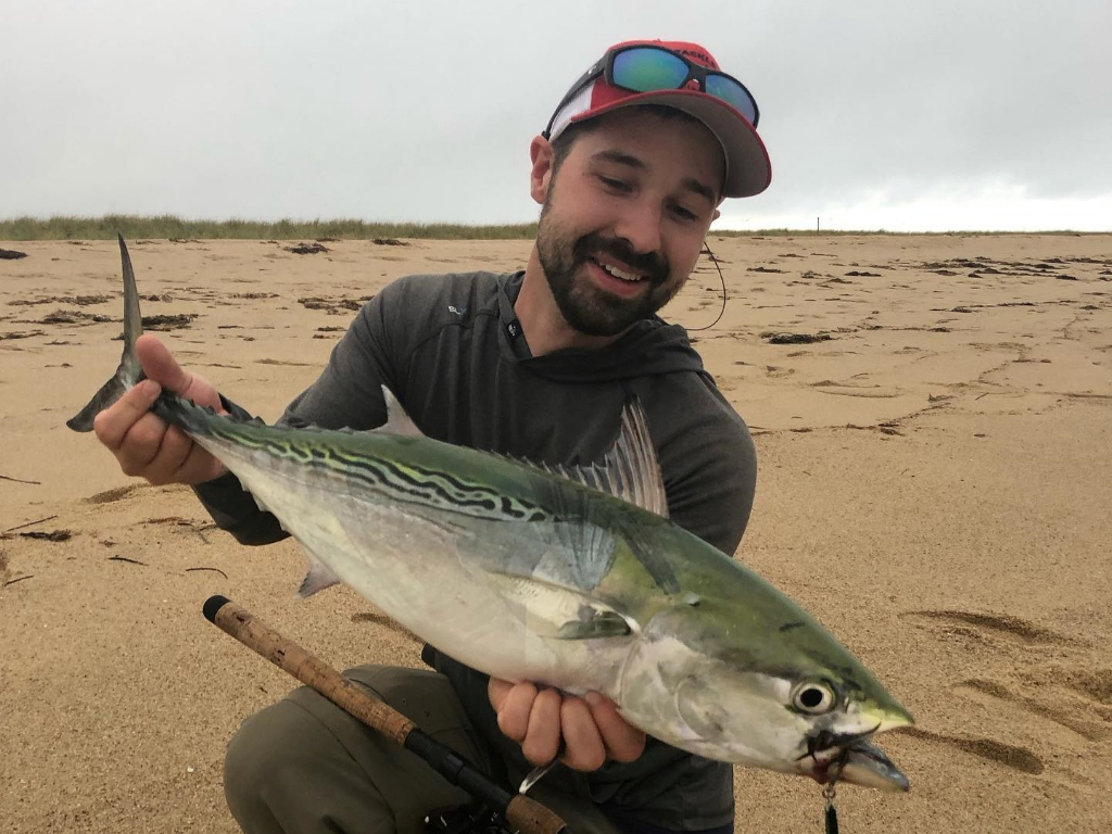 A person holding a 19-inch little tunny fish in Biddeford