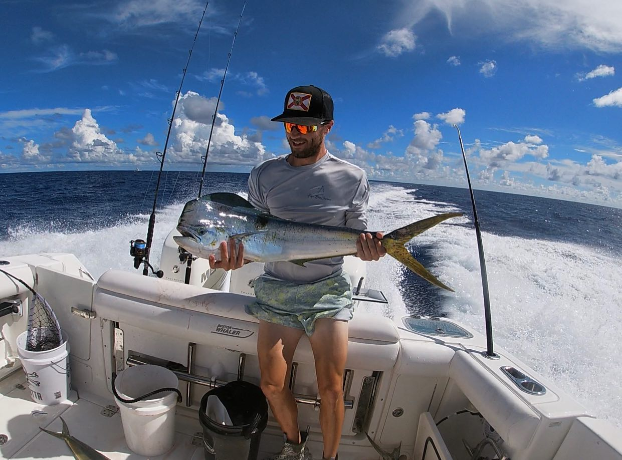 A person holding a huge fish in FL