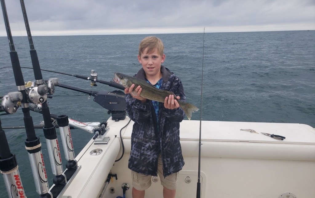 A single angler fishing on the shores of Lake Erie