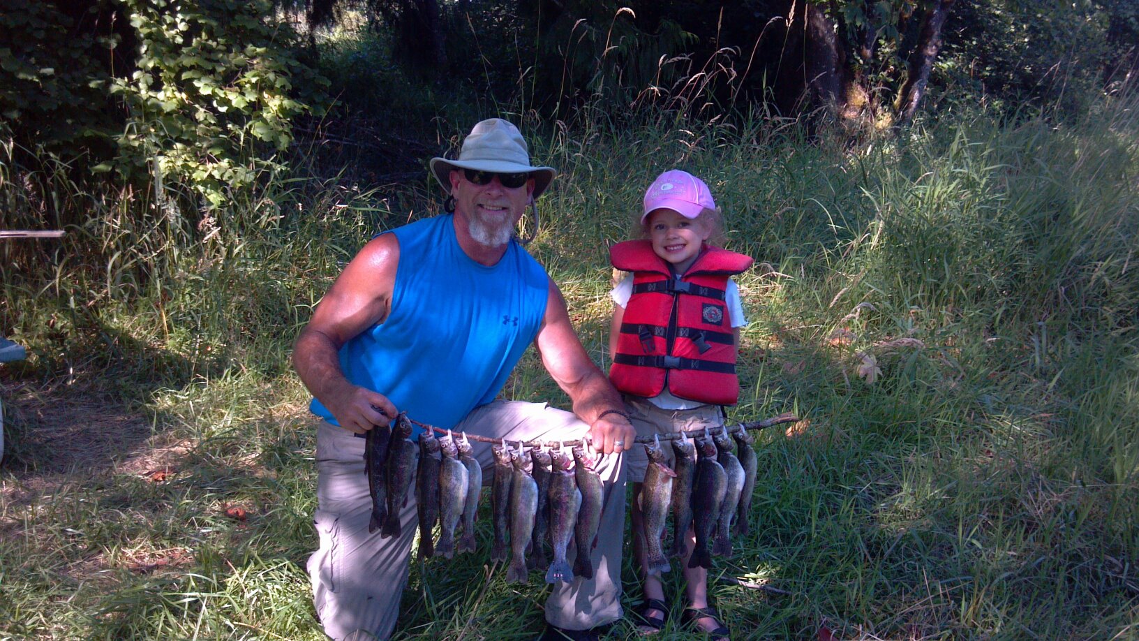 Multiple fish displayed on stringer after successful fishing trip in Walterville OR