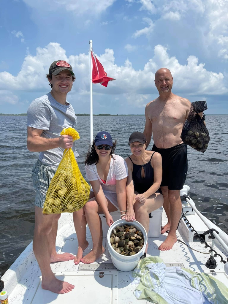 5 people fishing at a location in FL