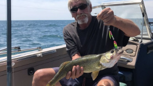 A person fishing in Palm Bay