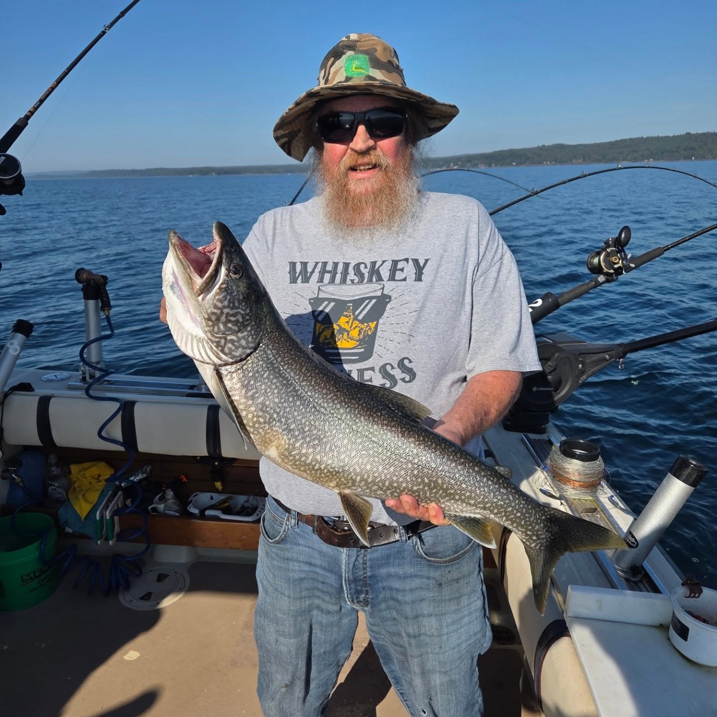 Lone fisherman in Minnesota catching a fish