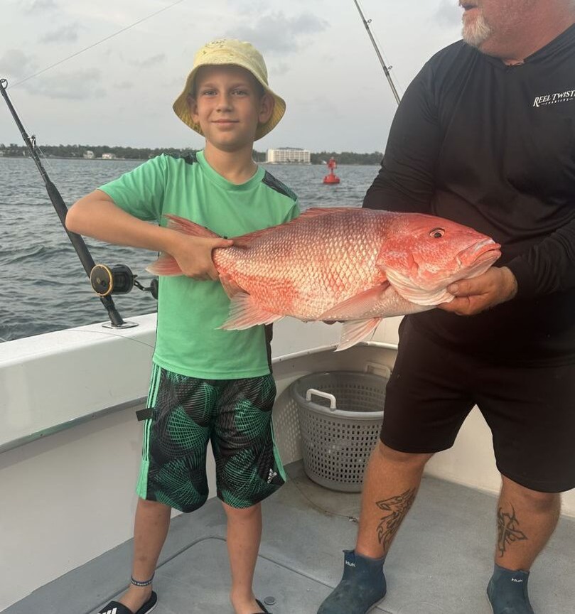 Fisherman with a big fish in Panama City