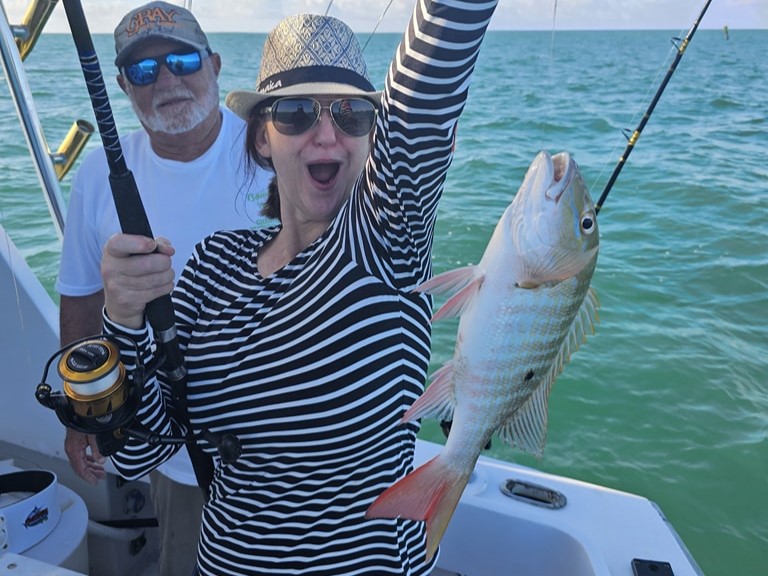A pair of anglers enjoying a fishing trip in Key West