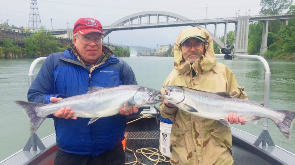 Two people fishing in the Bay City
