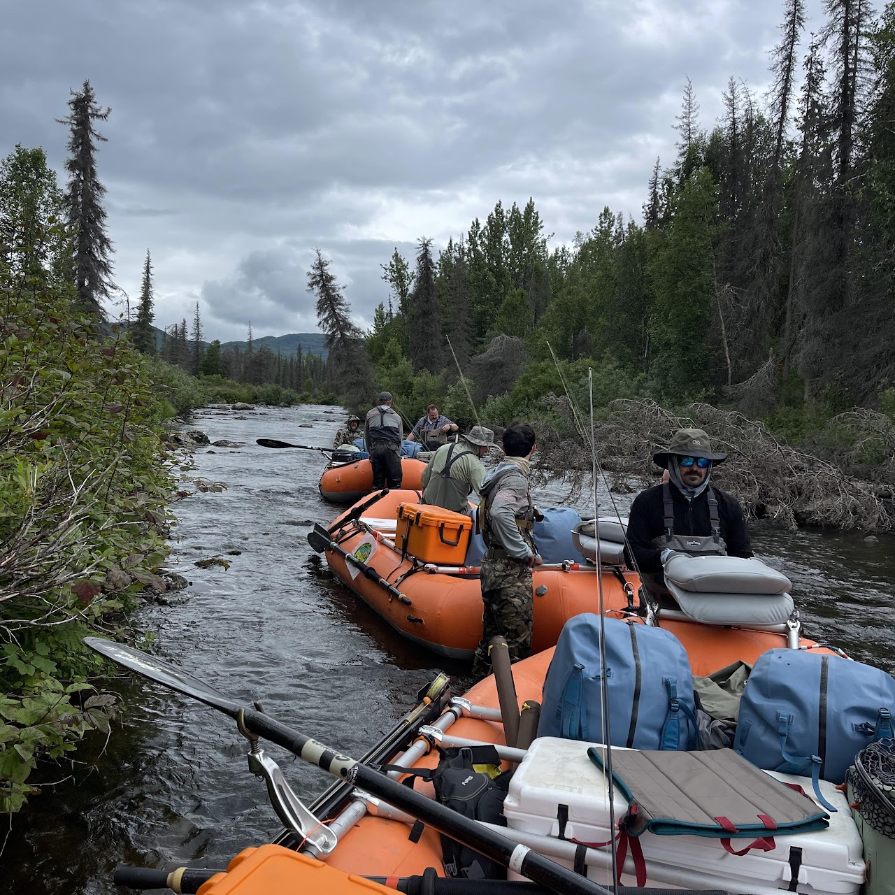 Three anglers in Soldotna, Alaska fishing