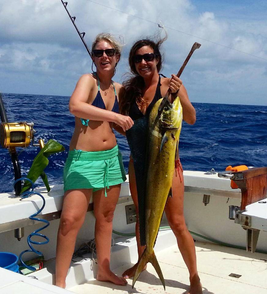 2 people enjoying fishing in Hawaii