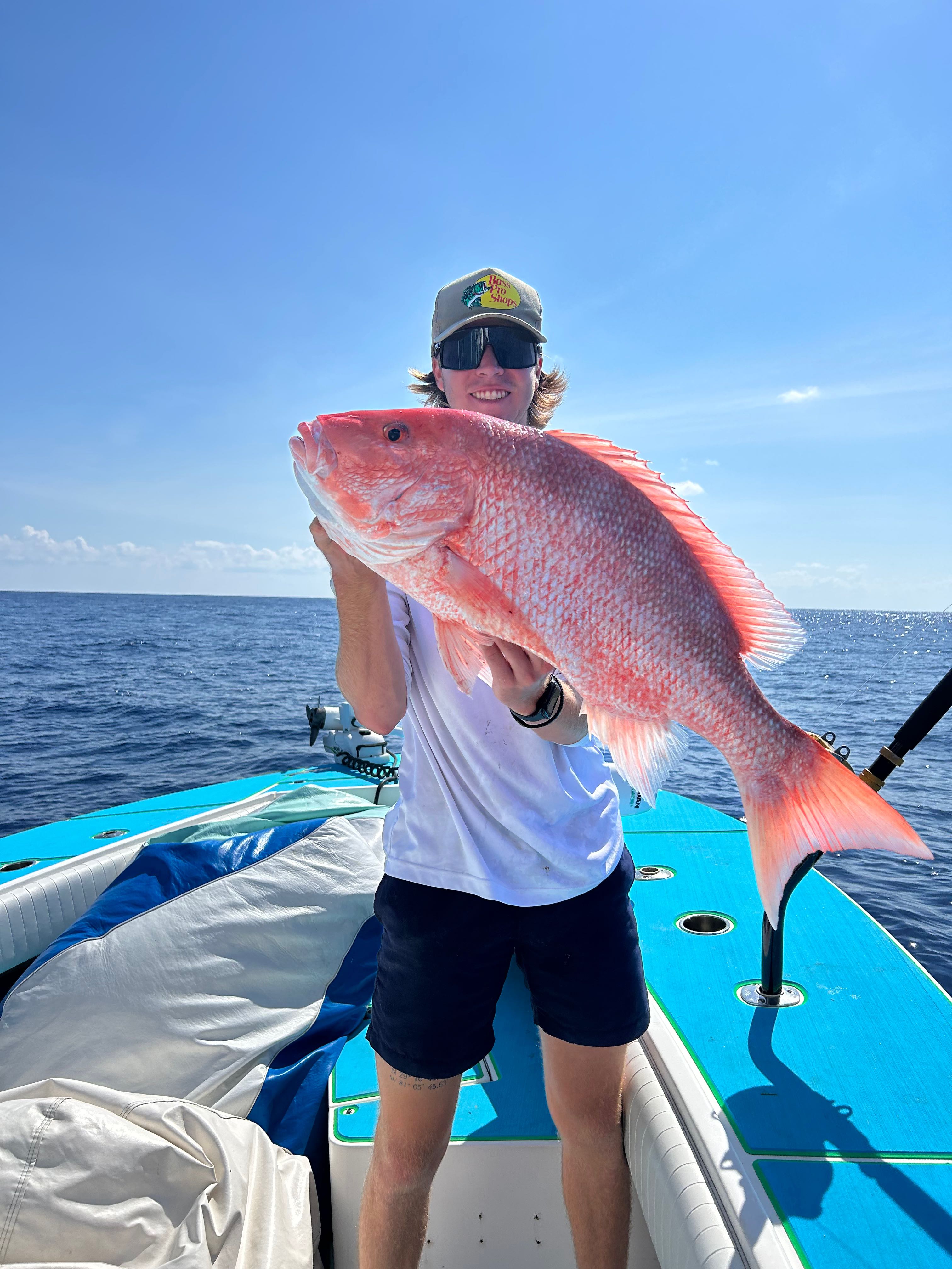 Angler holding a 29-inch fish in FL