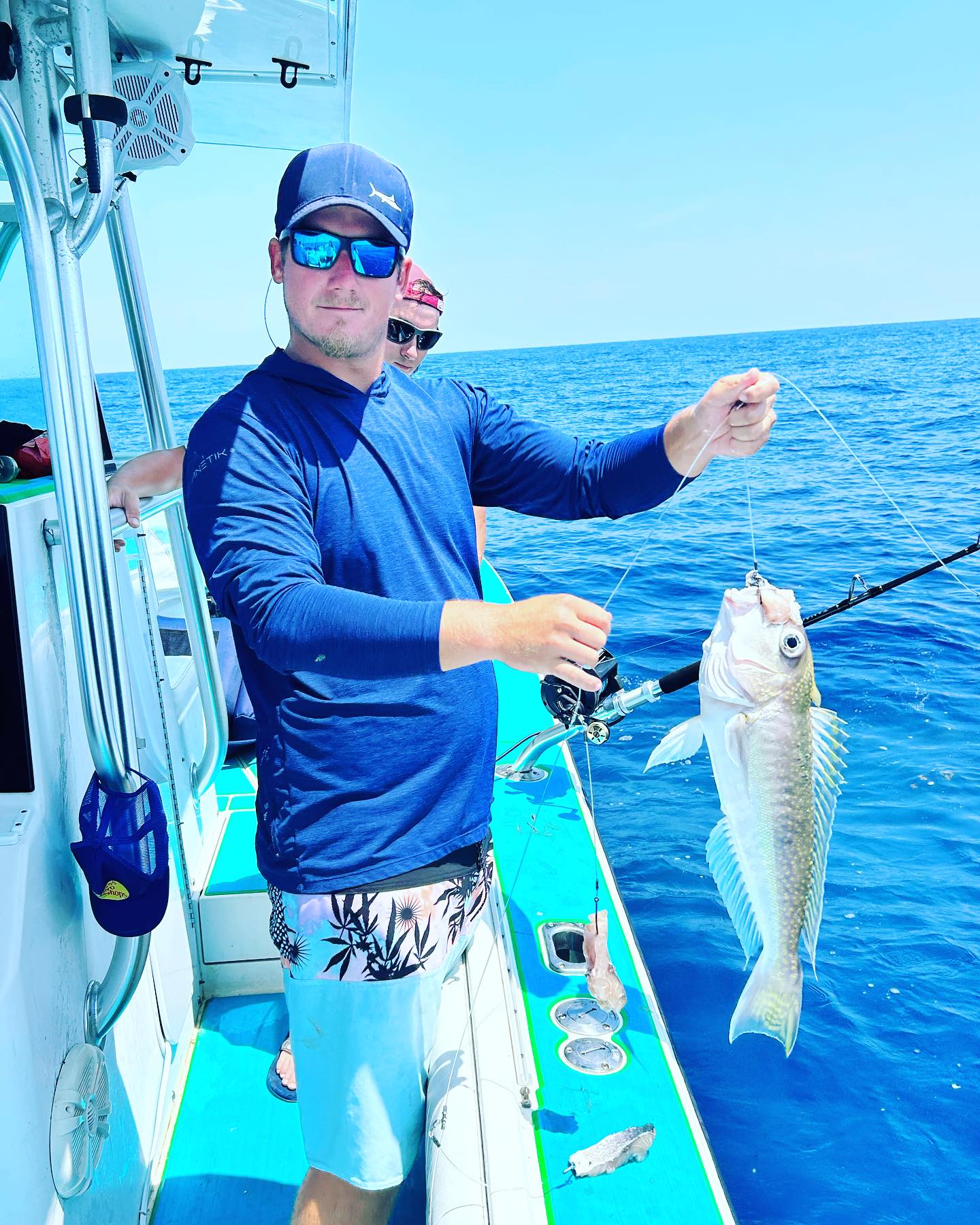 A person fishing with a rod in South Daytona