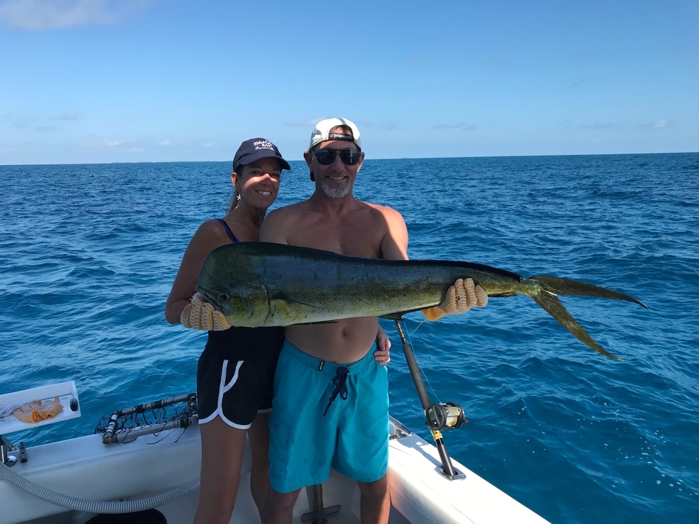 Two people enjoying fishing and water sports in FL