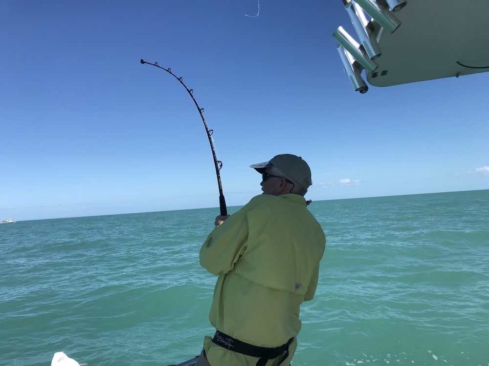 Person fishing in water in Florida