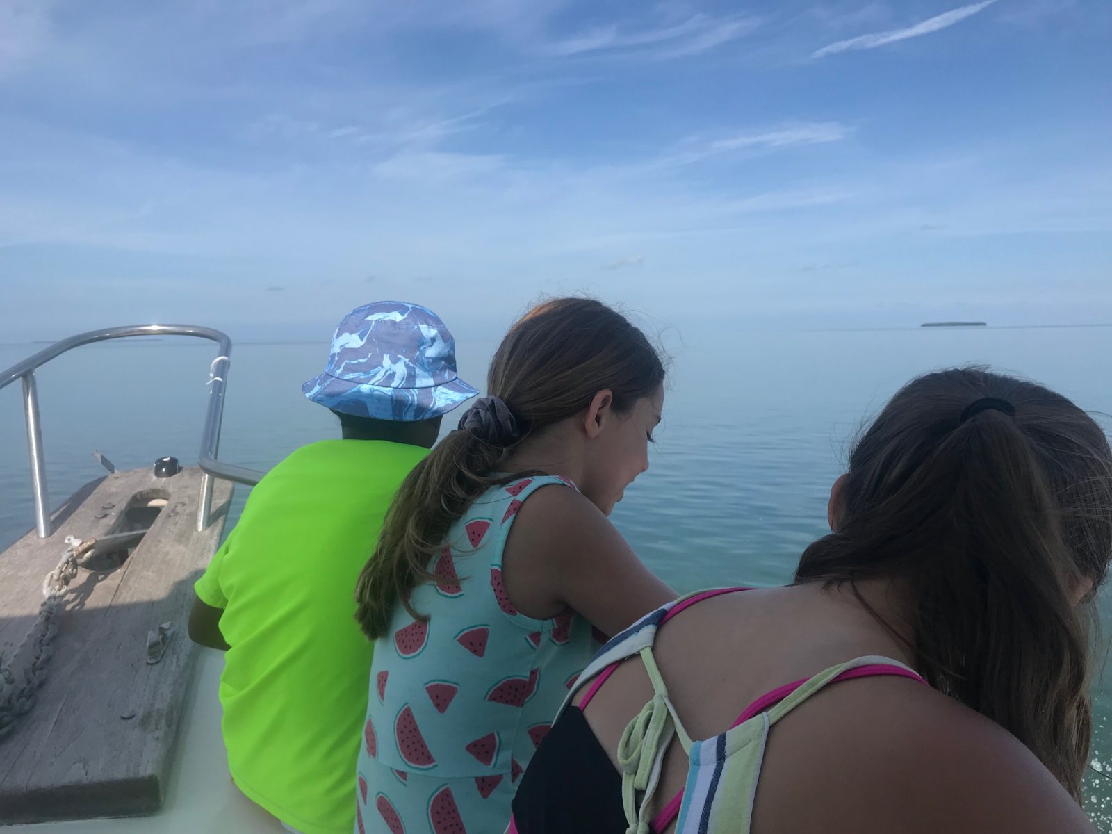 Kids fishing on Key West charter boat with Captain Manny catching reef fish in Florida Keys waters