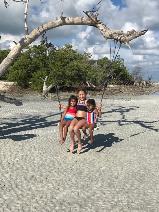 Kids fishing charter boat in Key West waters with Captain Manny, family-friendly inshore trip