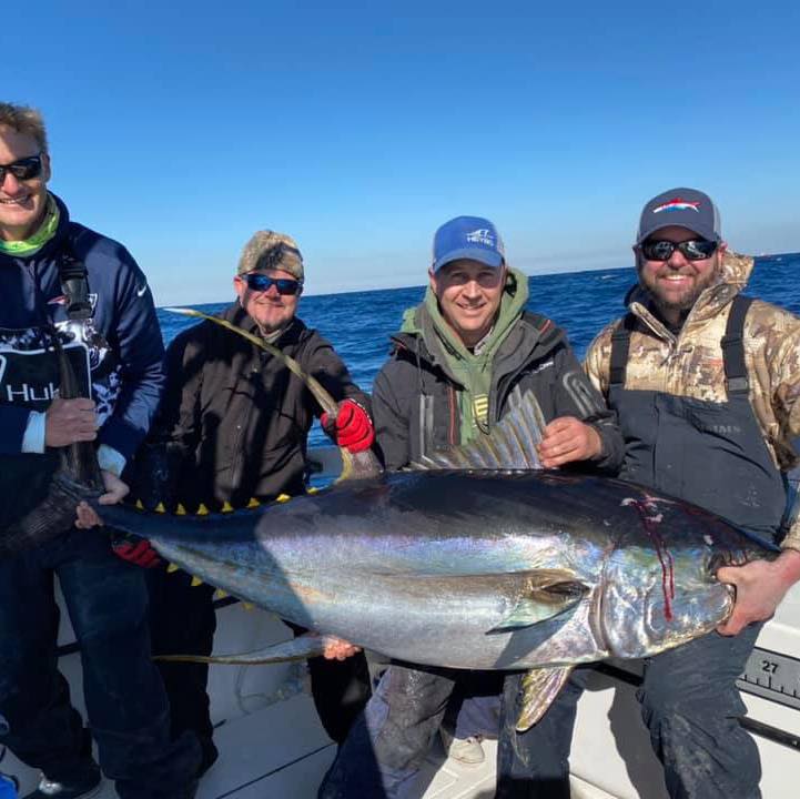 4 people enjoying a cruises and fishing trip on Dauphin Island