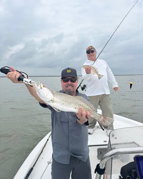 Speckled trout fishing success on boat in League City TX waters