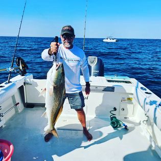 A lone angler fishing at Fernandina Beach