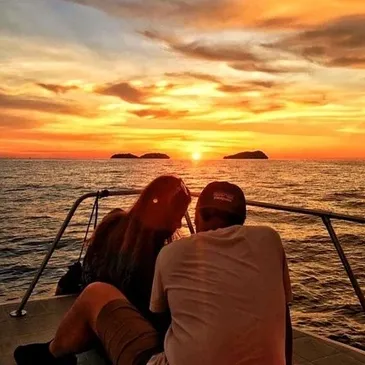 Private sunset wine and cheese cruise boat departing from Fajardo, Puerto Rico at golden hour
