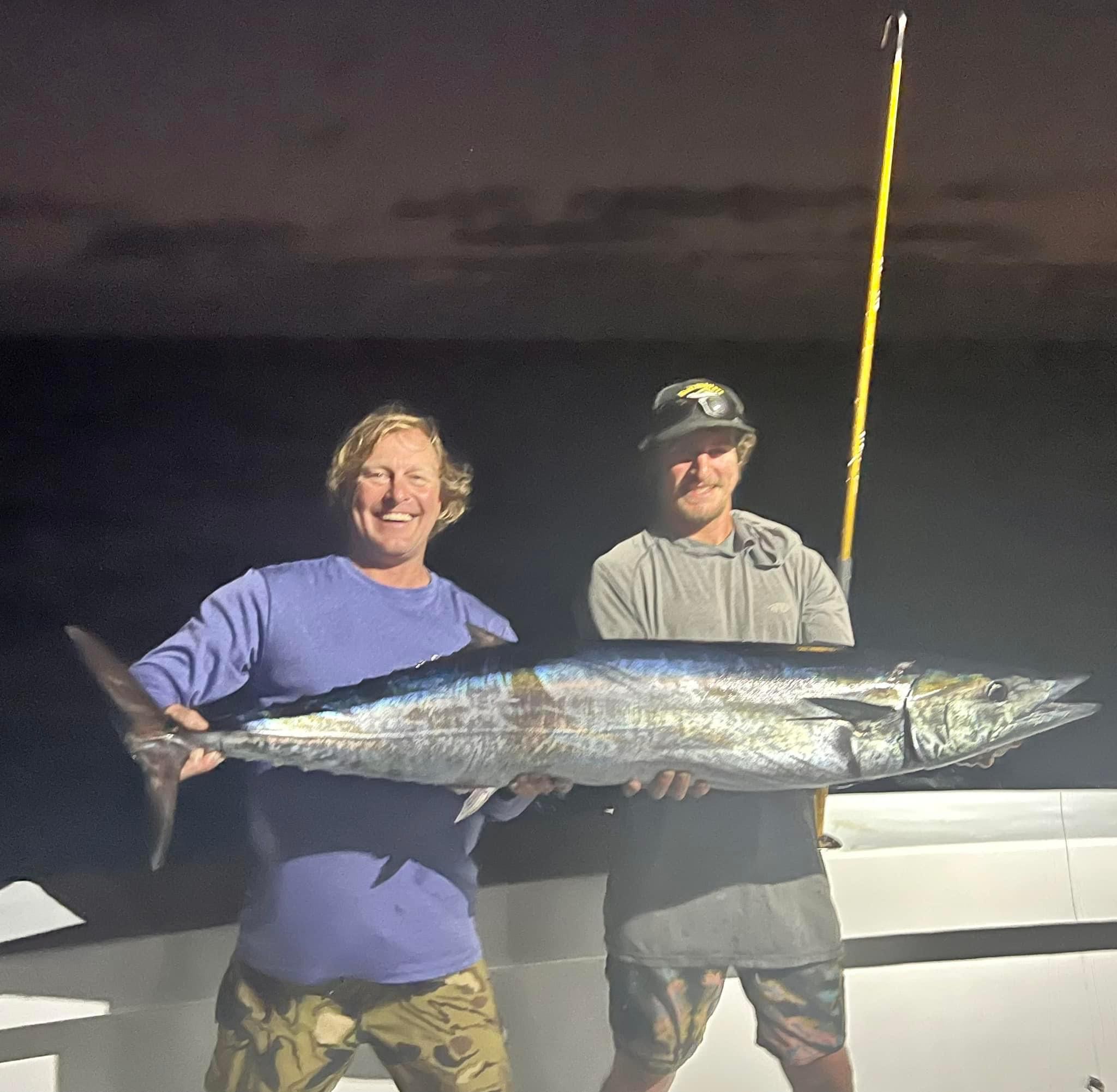 Wahoo fish caught by two people in Islamorada