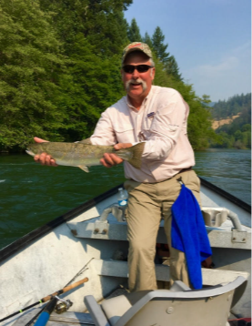 A lone angler enjoys a successful fishing trip in Merrill
