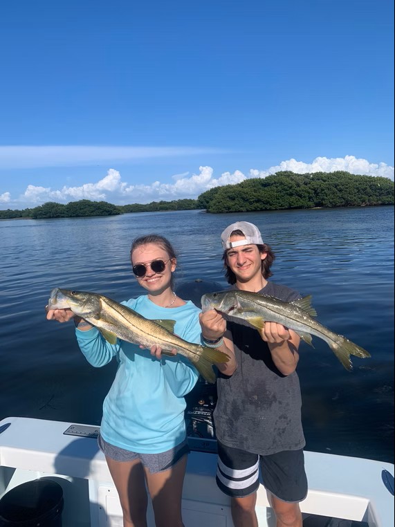 Two anglers fishing in Holmes Beach