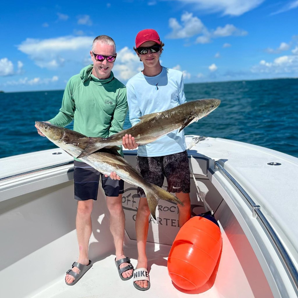 Two anglers with a big 35-inch fish in FL