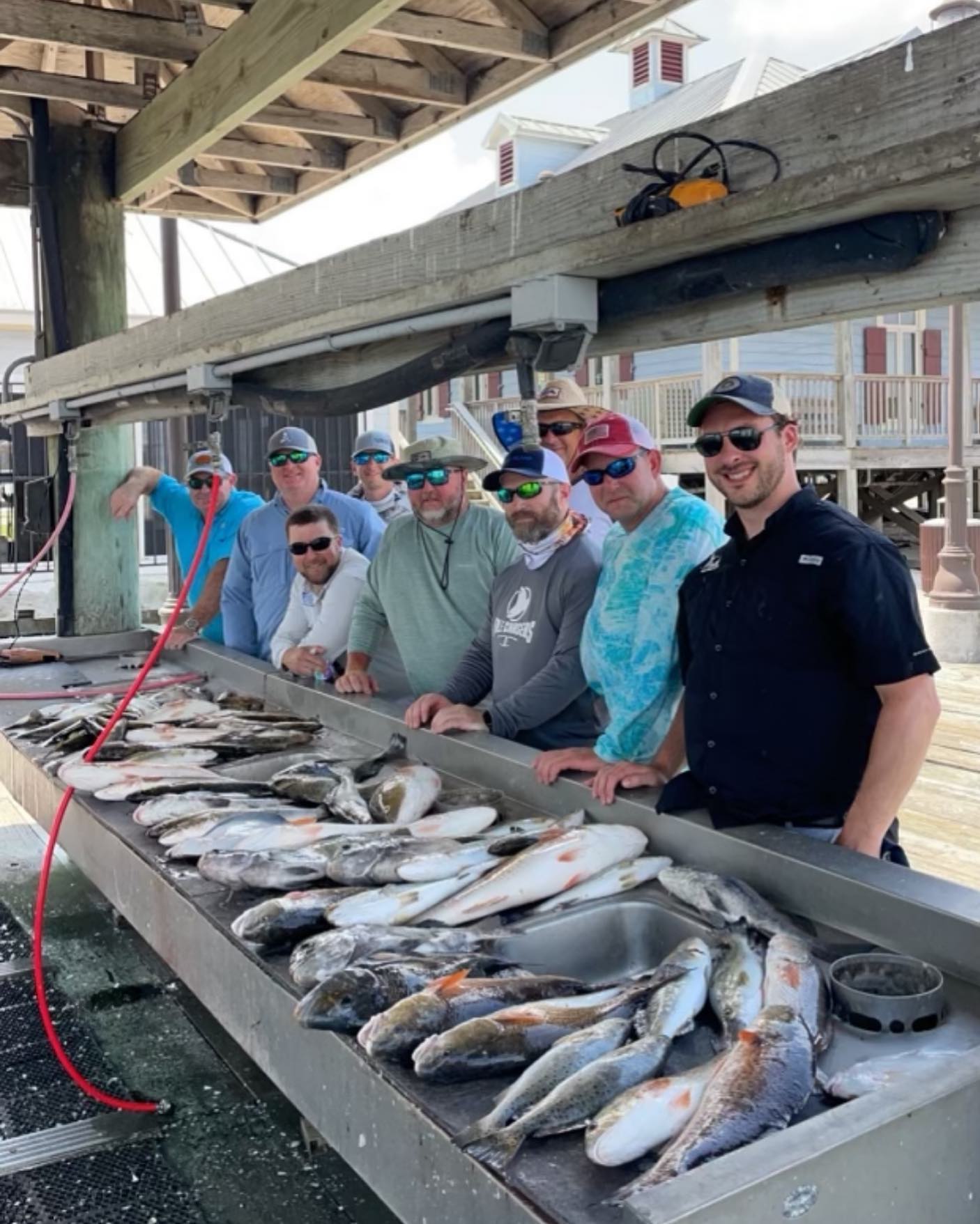 Group of 9 people enjoying fishing in LA