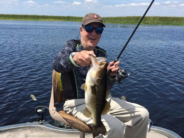 A lone angler with a 19-inch catch in South Bay
