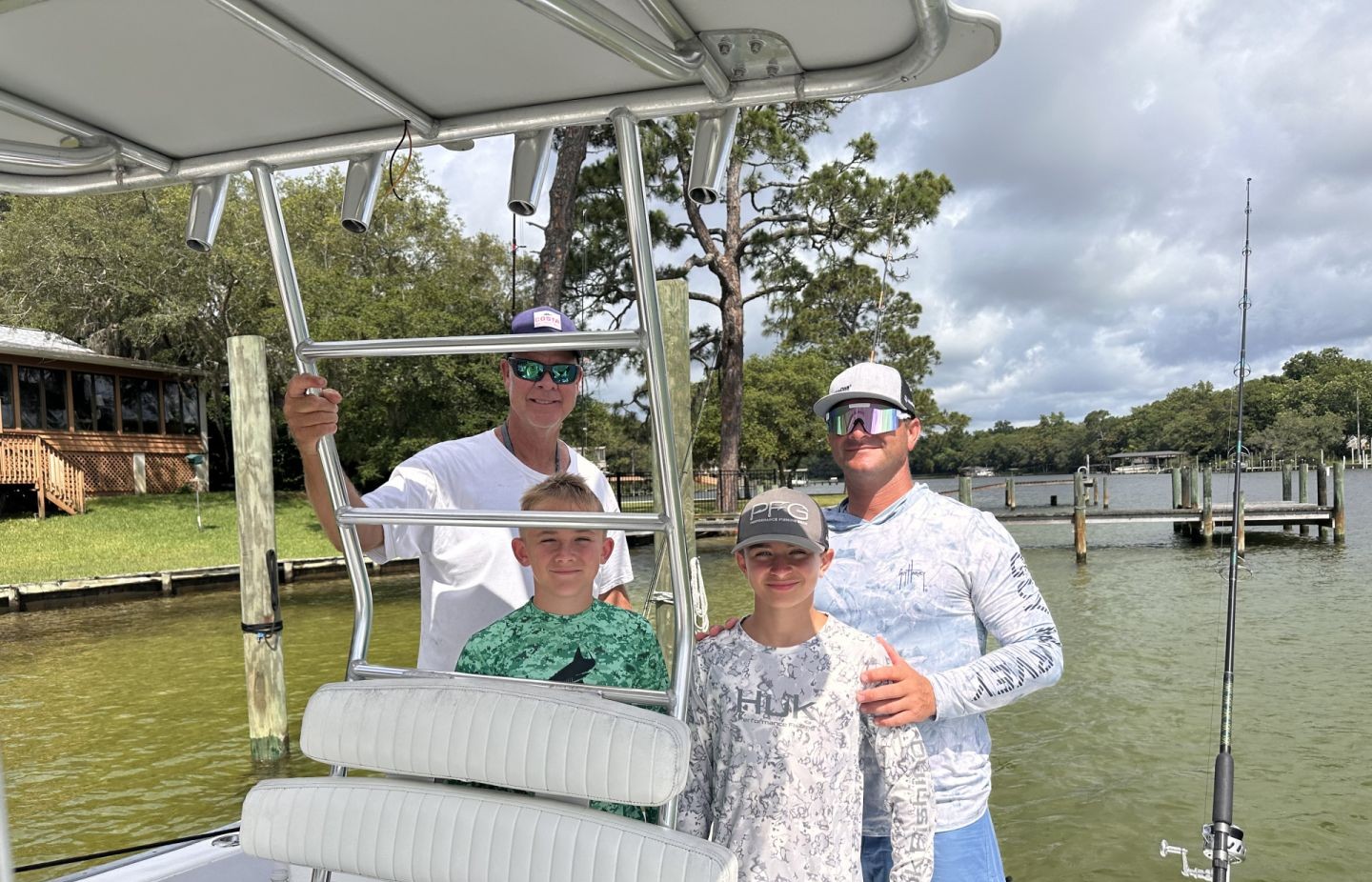 4 people enjoying a fishing trip at Fort Walton Beach