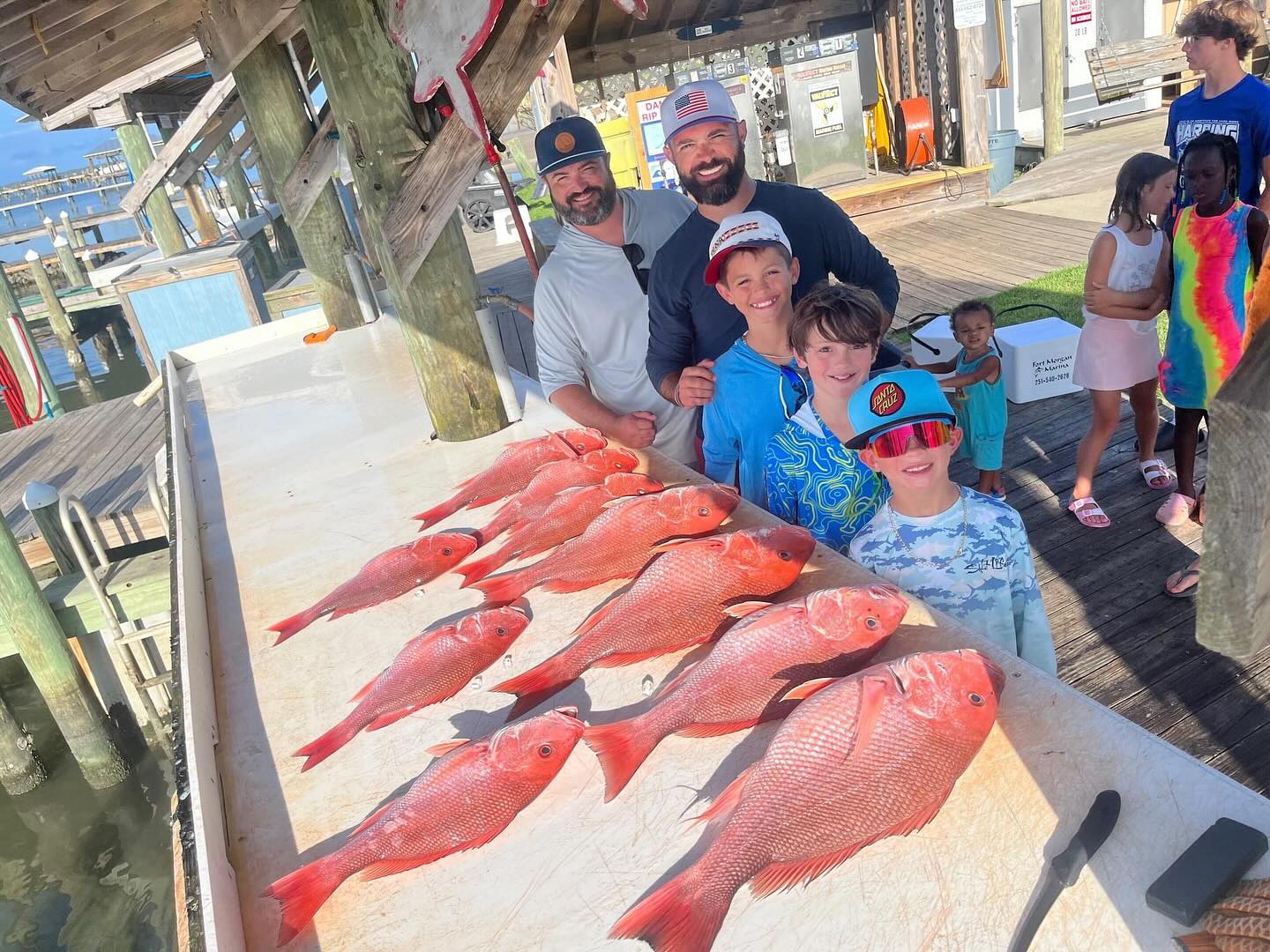 Eight people fishing at Fort Morgan, Alabama