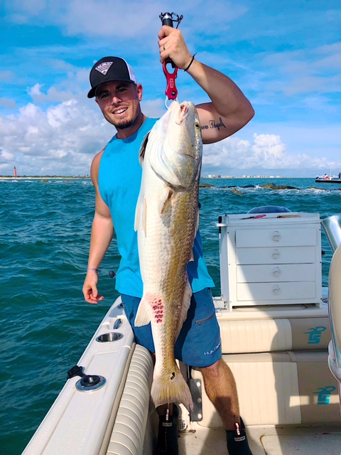 Large redfish caught while fishing in New Smyrna Beach FL