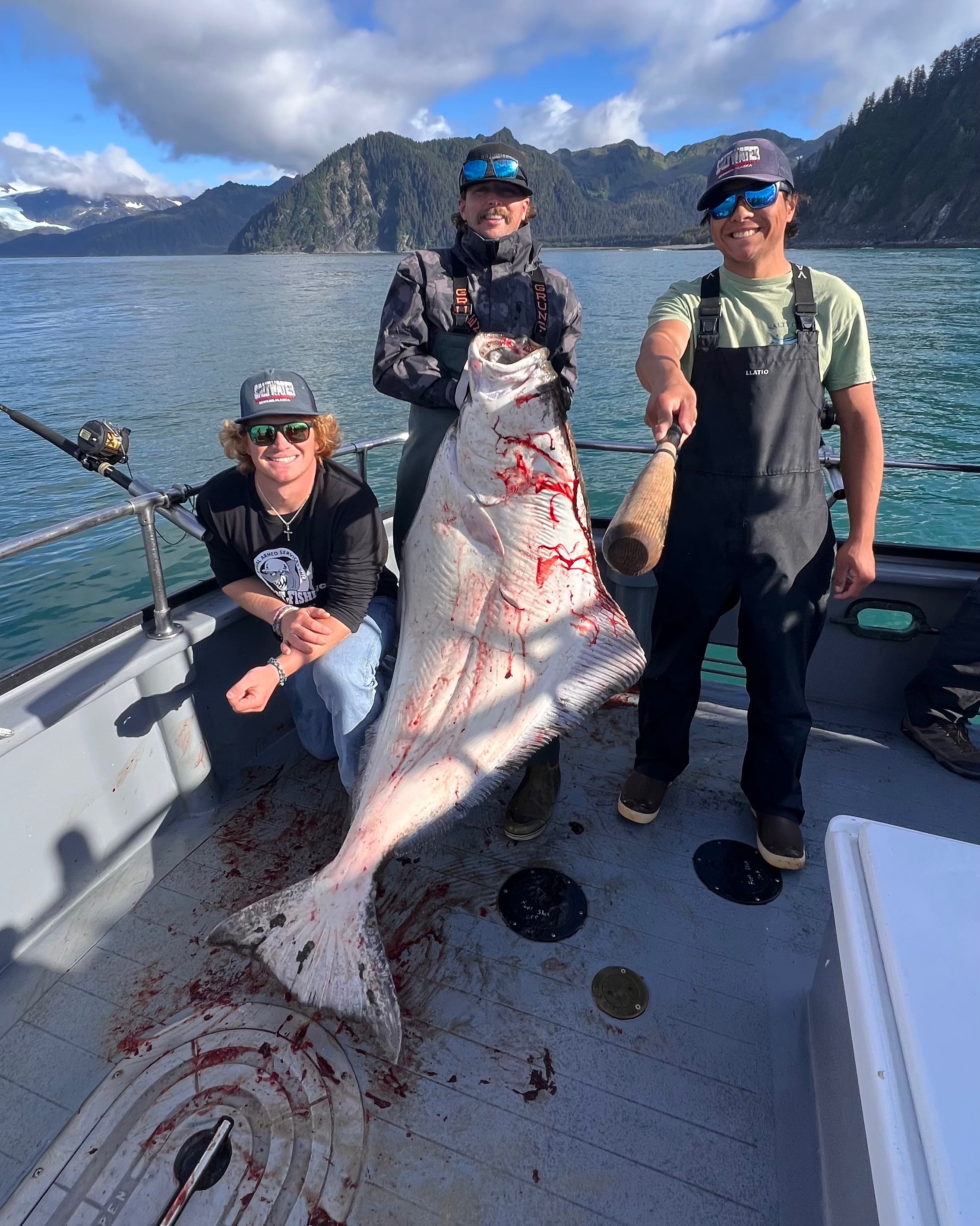 Three people fishing in Seward