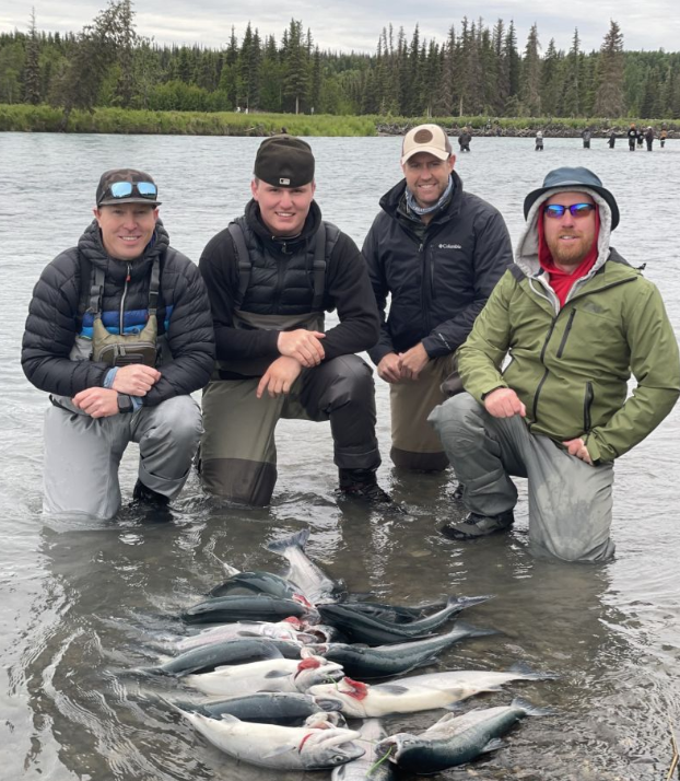4 people fishing in Cohoe
