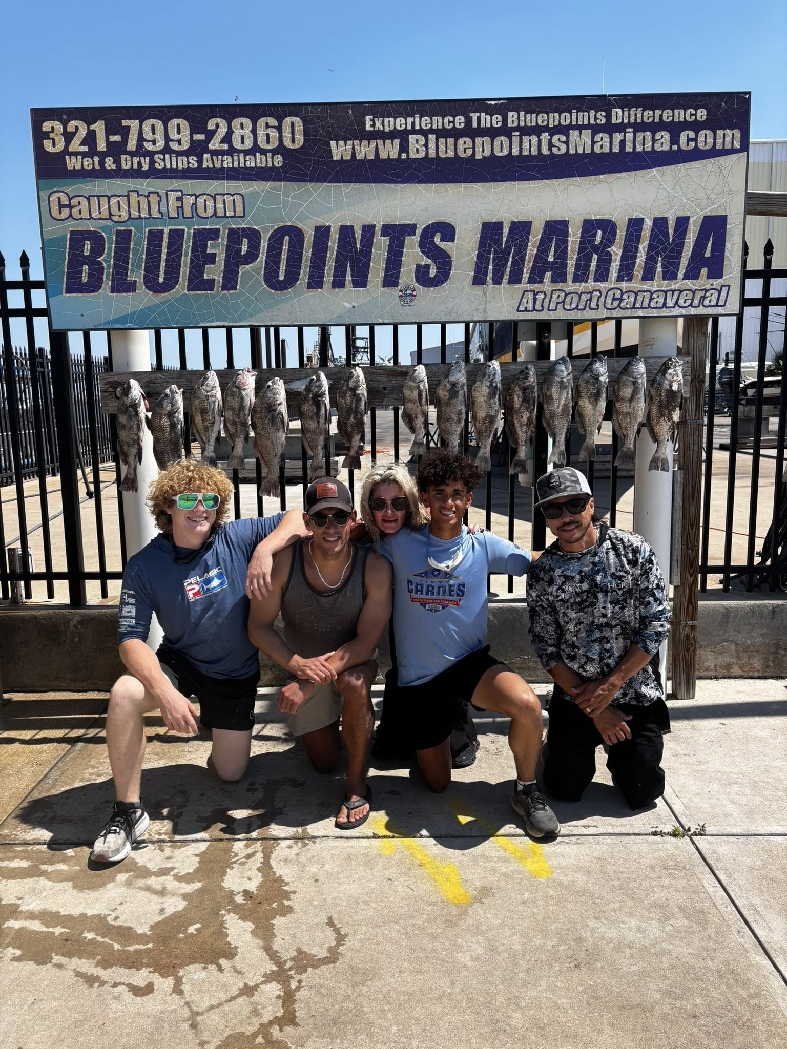 Fishing charter catch display showing black drum and other fish at Port Canaveral marina