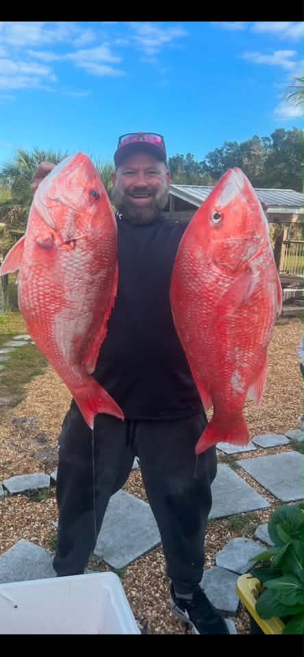 Two large red snapper caught fishing in Port Canaveral FL
