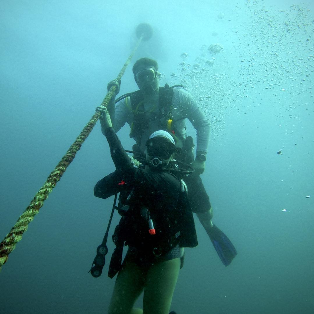 Key Largo scuba divers exploring coral reefs and shipwrecks in Florida Keys waters