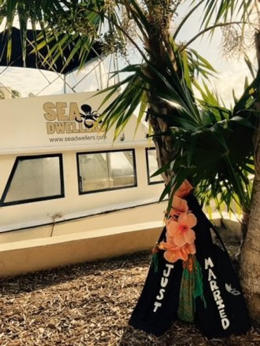 Underwater wedding ceremony in Key Largo Florida Keys with scuba diving couple and officiant