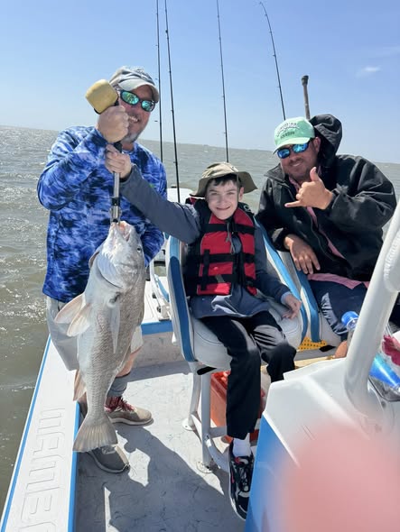 Fishing trip in Corpus Christi TX with large fish catch on boat