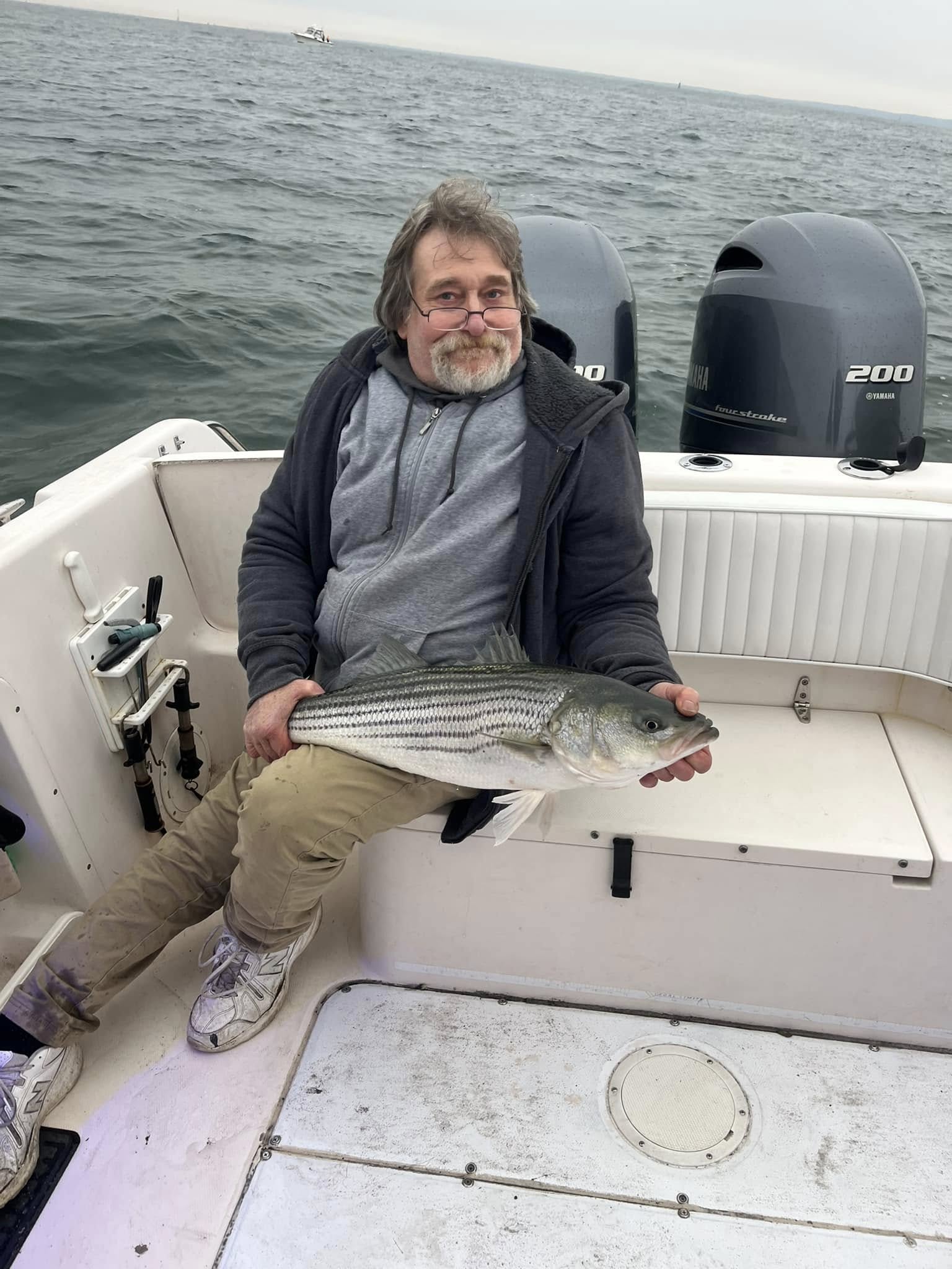 Striped bass catch on fishing boat in Woodbridge Township NJ waters