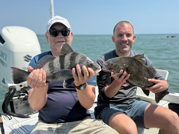 Two black drum fish caught during fishing trip in Mount Pleasant SC