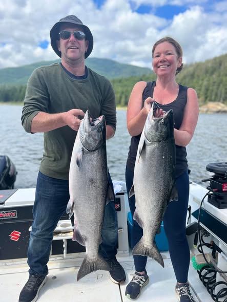 Two anglers fishing in BC enjoying the outdoors