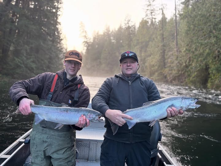 Fishing guide and angler on river targeting salmon and steelhead in Port Alberni BC summer charter