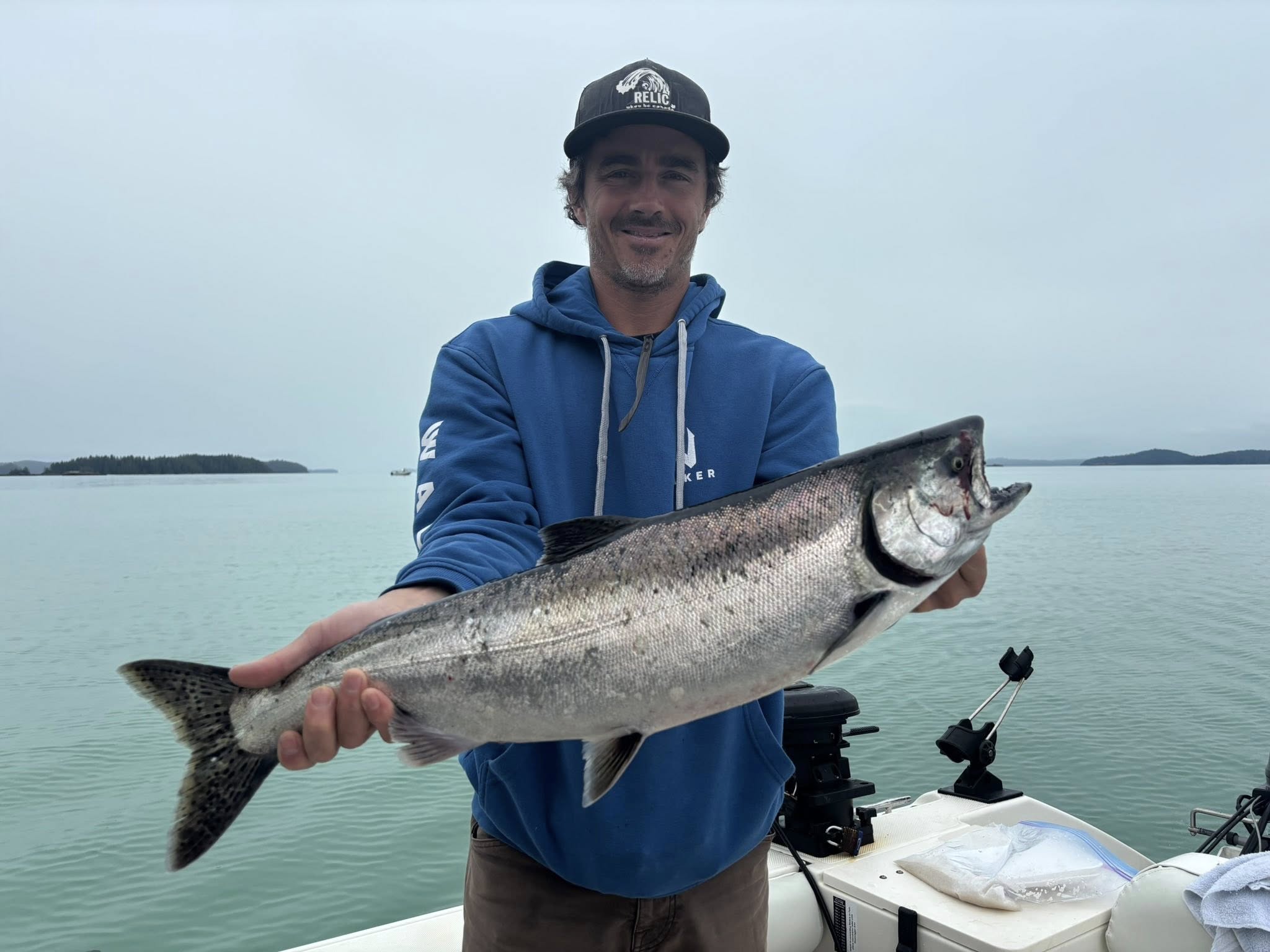 Chinook salmon fishing charter boat on Alberni Inlet, Port Alberni BC with anglers fishing