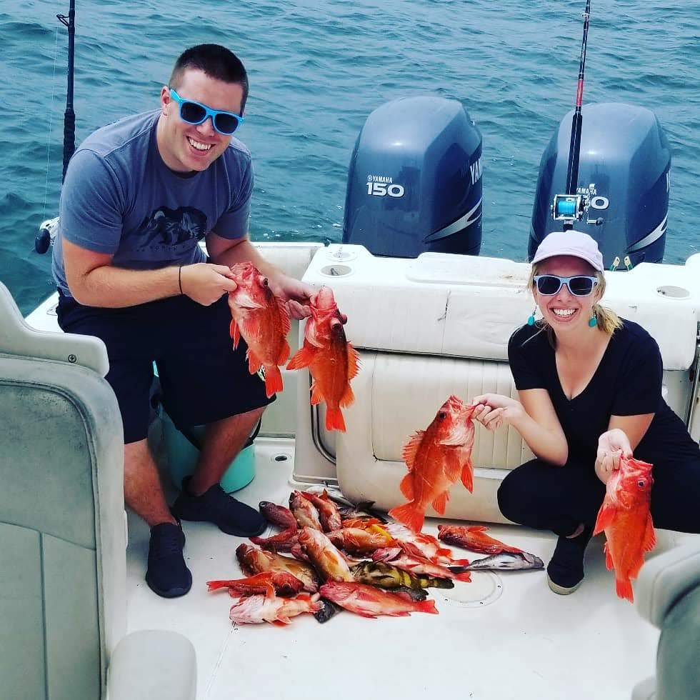 Anglers with a catch of four fish in San Diego